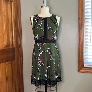 EUC dress. Polyester/spandex sleeveless dress with lace trim.